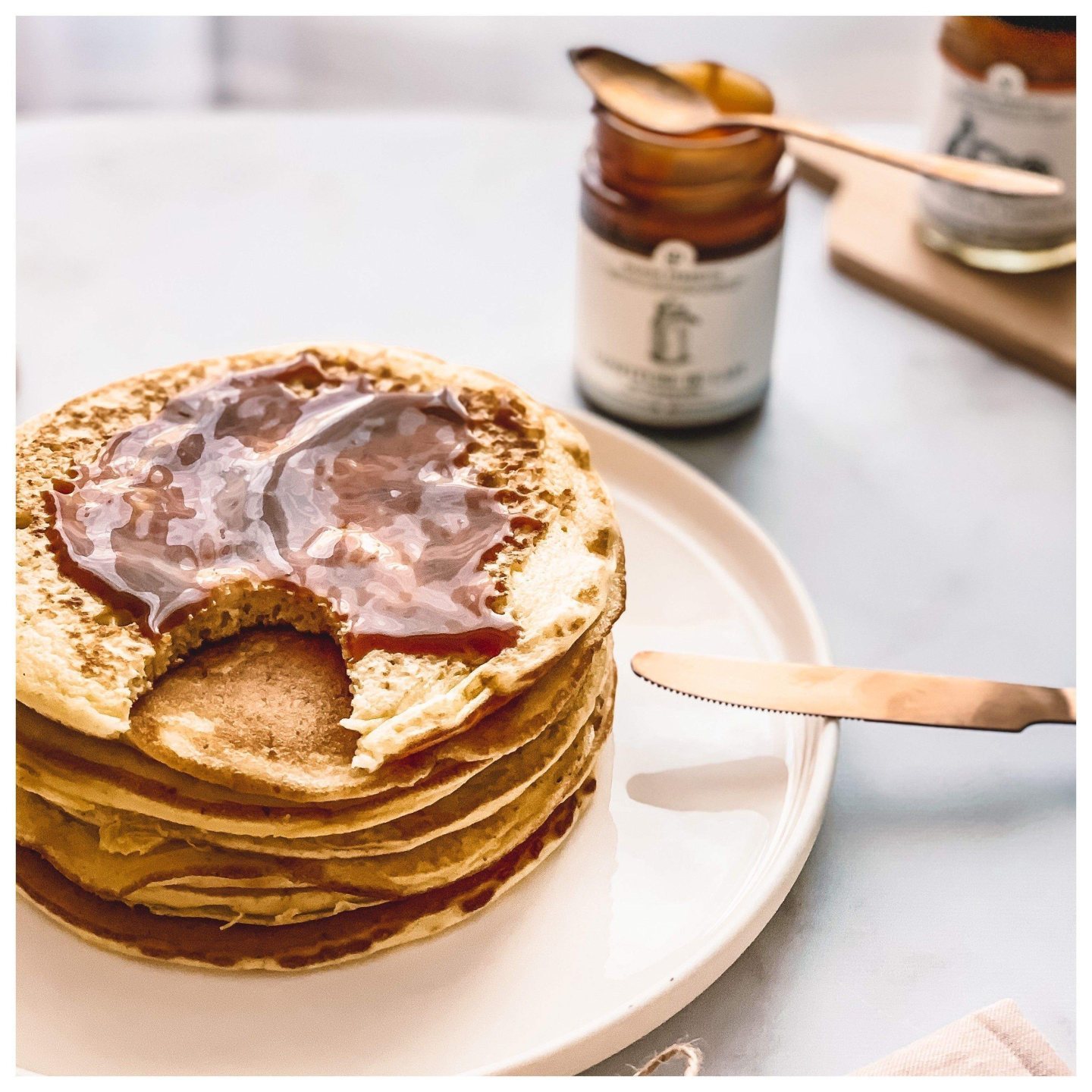 Stack of buttermilk pancakes on a plate